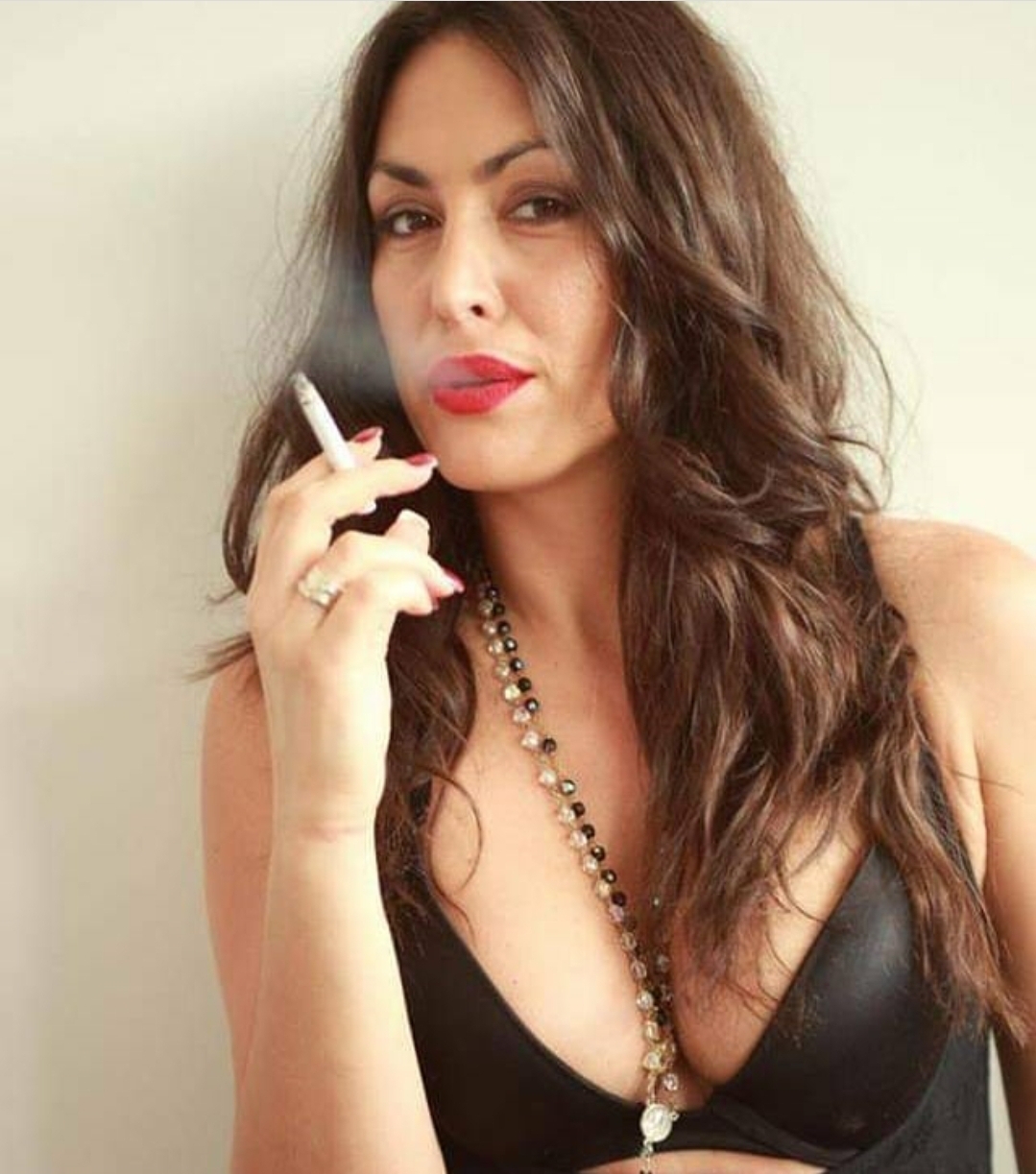 Women Smoking Cigarettes — 26