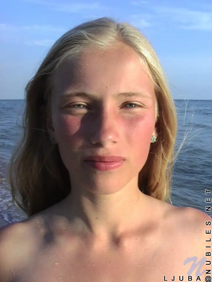 Ljuba's getting down to business at a nude beach, flaunting her modest bosom with perkily protruding nipples. — 14
